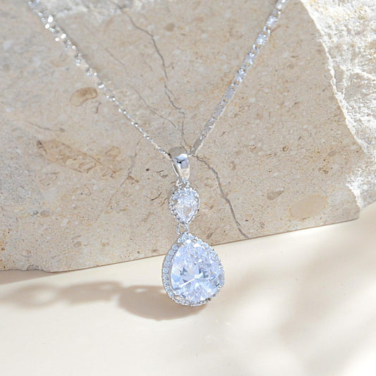 Elegant Waterdrop Pendant Necklace for Women | Brass Plated with White Gold & Set with Cubic Zirconia Gemstones | Statement Jewelry for Wedding, Banquet & Party